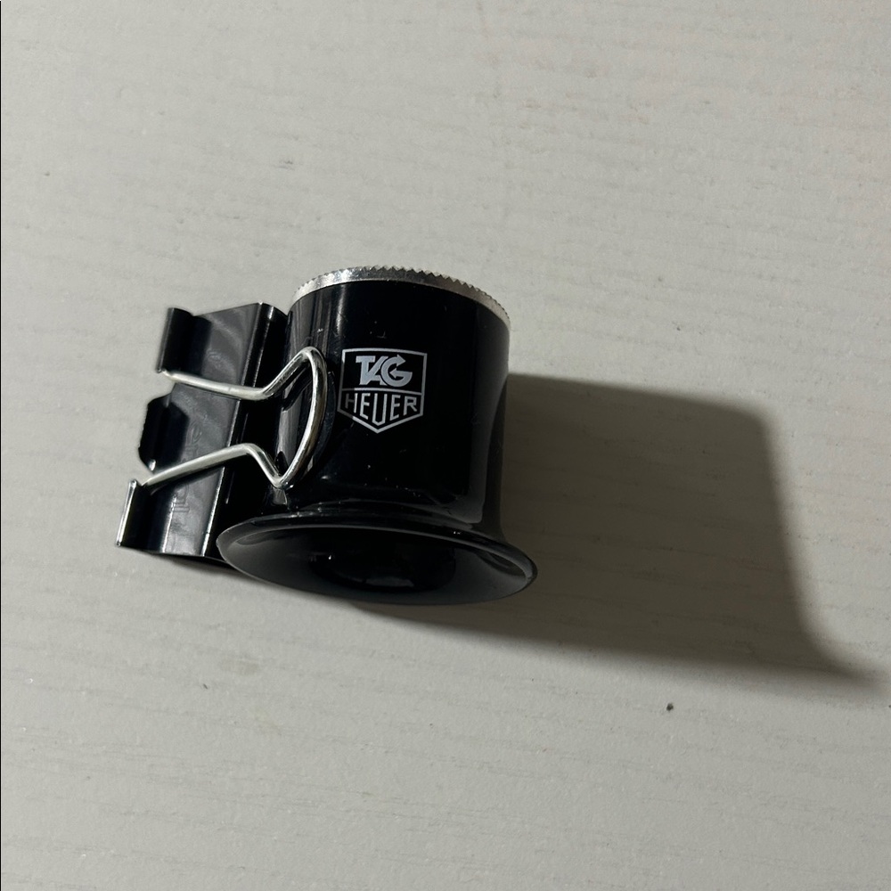 TAG Heuer Black and Silver Magnifying glass.